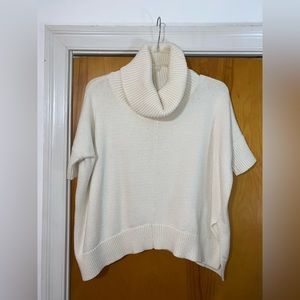 Short sleeve cowl neck.